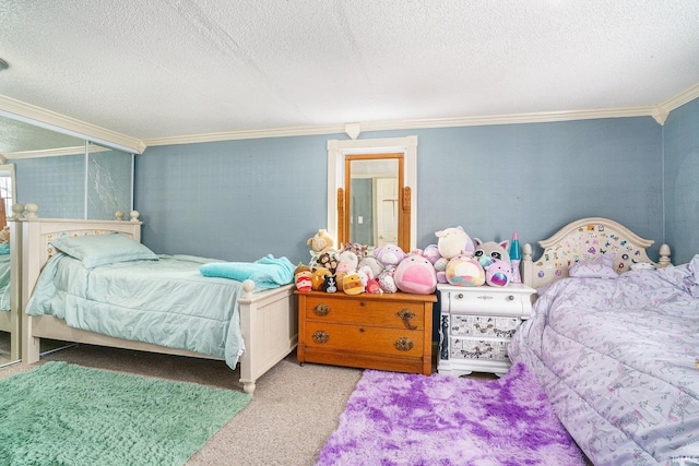 carpeted bedroom with ornamental molding and a textured ceiling