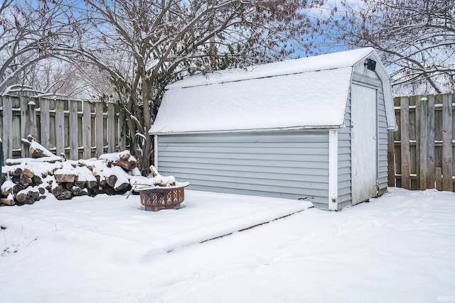 view of snow covered garage