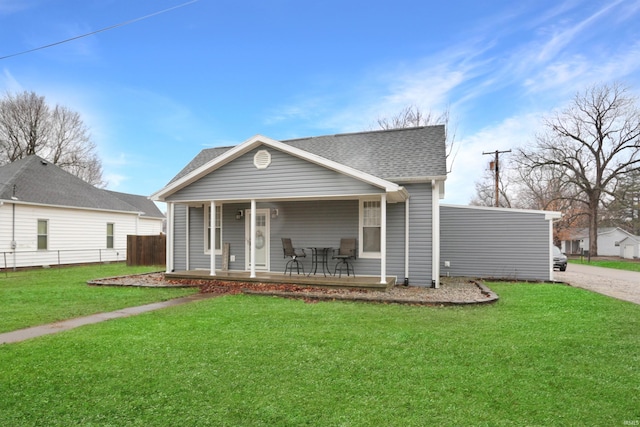 view of front facade with a porch and a front yard