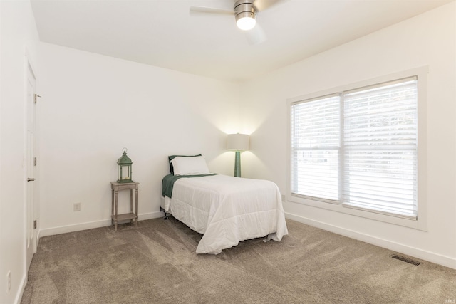 carpeted bedroom featuring ceiling fan