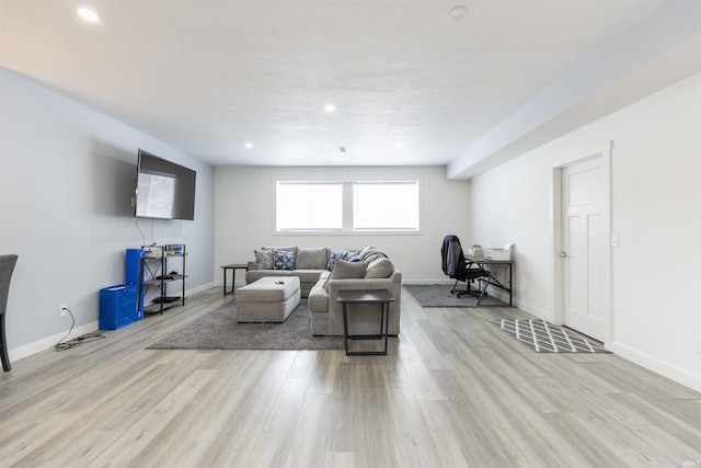 living room with light hardwood / wood-style floors