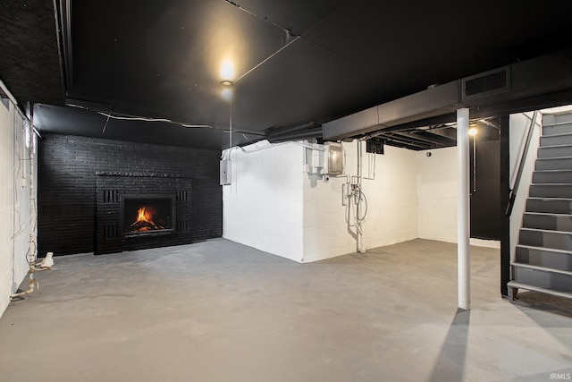 basement with a fireplace