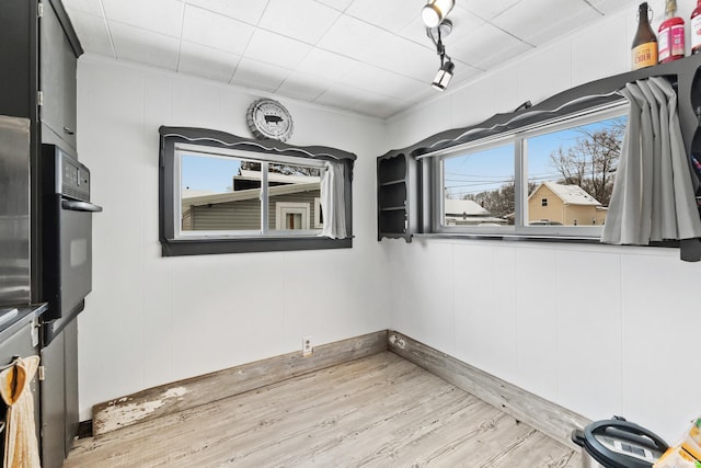 spare room featuring light wood-type flooring