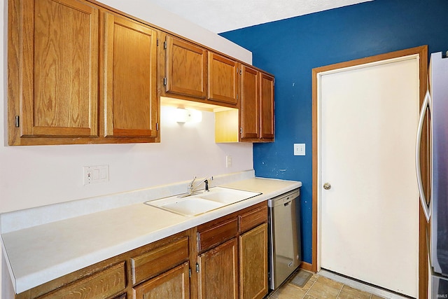 kitchen featuring appliances with stainless steel finishes and sink