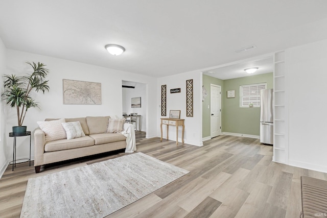 living room featuring light wood-type flooring