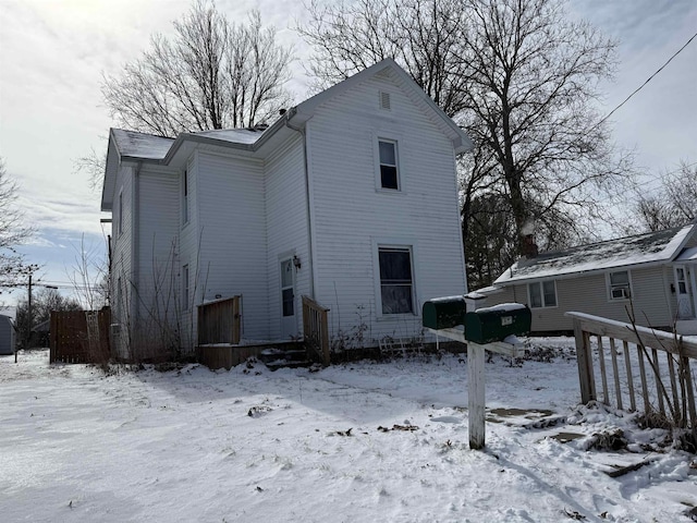 view of snow covered property