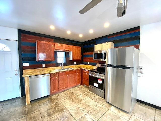 kitchen with appliances with stainless steel finishes and sink