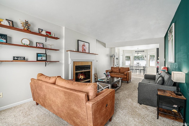 carpeted living room with a fireplace