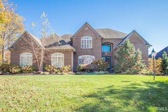 view of front property with a front lawn