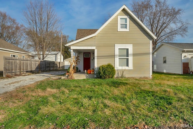 view of front of home with a front yard