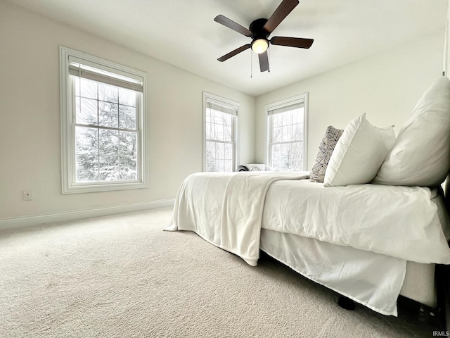 bedroom featuring carpet floors and ceiling fan