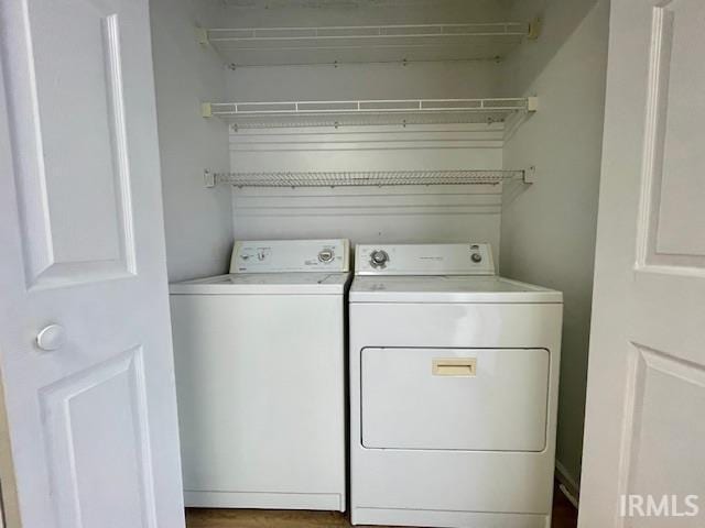 laundry area featuring independent washer and dryer