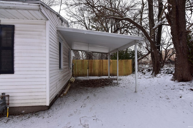 view of yard layered in snow