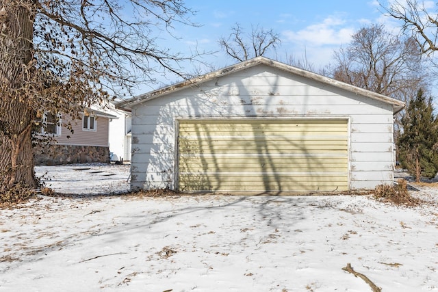 view of snow covered garage