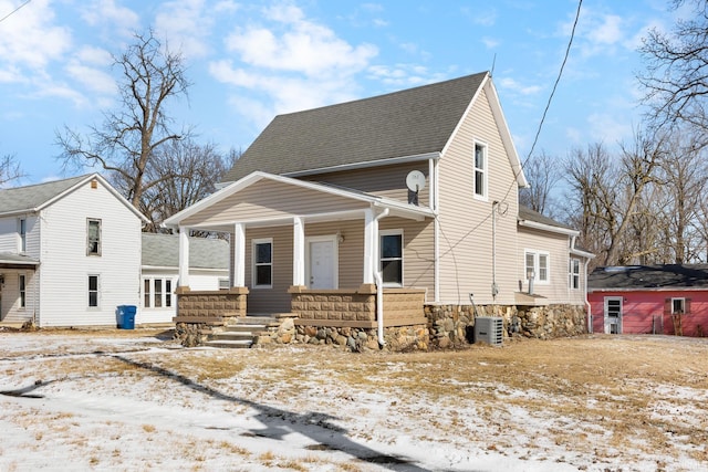 view of front of property featuring covered porch and central AC unit