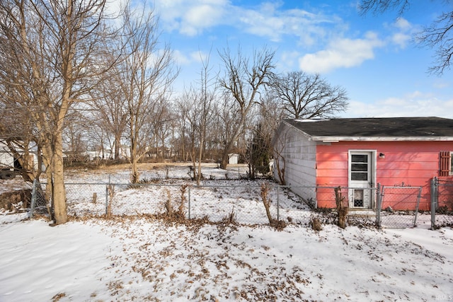 view of yard covered in snow