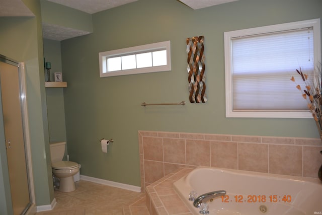 full bathroom featuring tile patterned flooring, toilet, baseboards, a whirlpool tub, and an enclosed shower