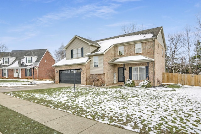 view of front of property featuring a garage