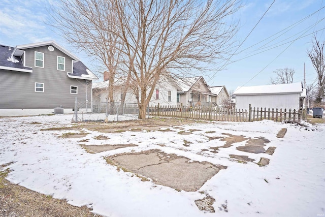 view of yard covered in snow