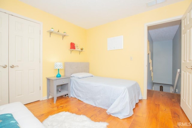 bedroom featuring wood-type flooring