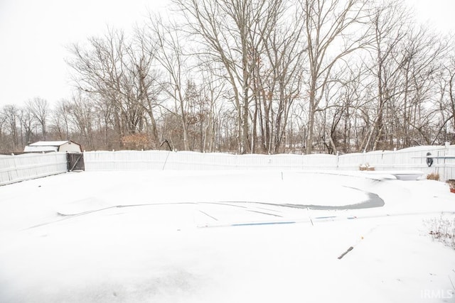 view of yard layered in snow