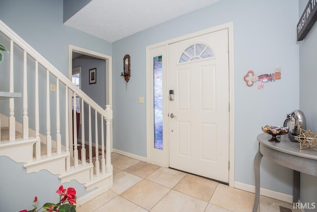 view of tiled foyer entrance