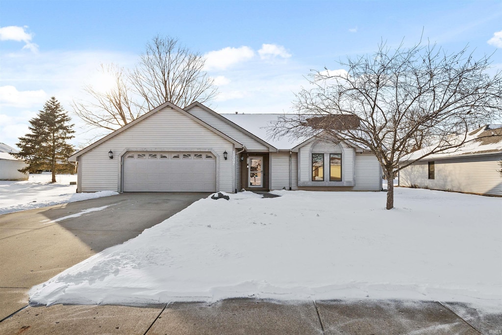 single story home featuring a garage