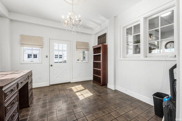 interior space with a notable chandelier