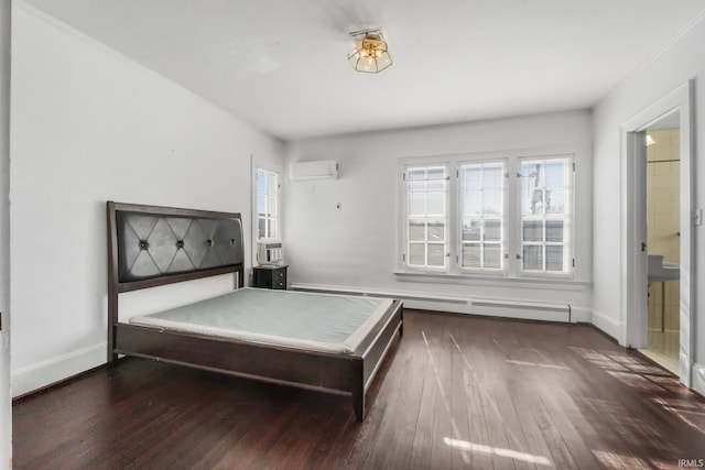 unfurnished bedroom with dark hardwood / wood-style flooring and a wall mounted AC