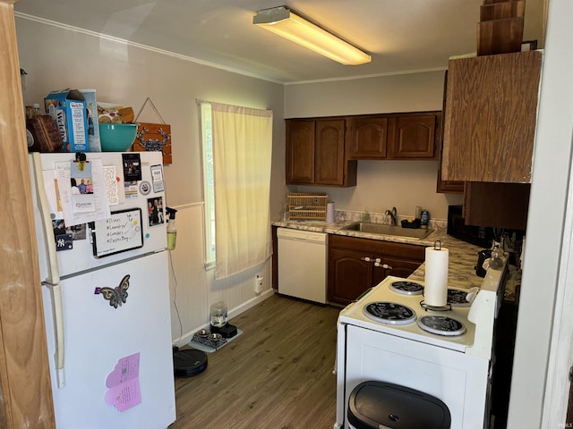 kitchen featuring sink, white appliances, crown molding, and dark hardwood / wood-style floors