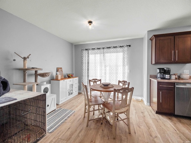 dining room featuring light hardwood / wood-style flooring