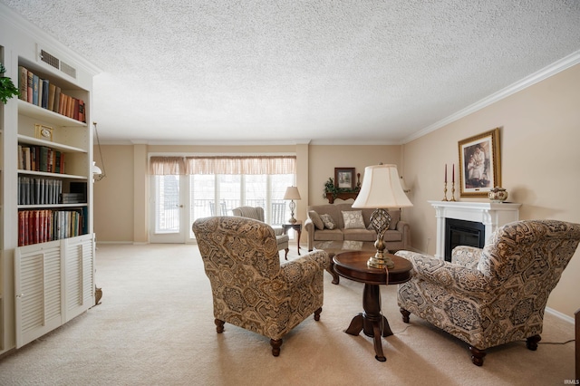 living room featuring crown molding, a textured ceiling, and light colored carpet