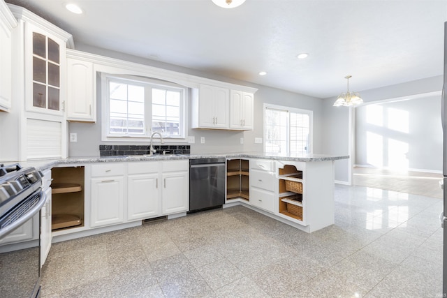 kitchen featuring white cabinets, appliances with stainless steel finishes, sink, and light stone counters