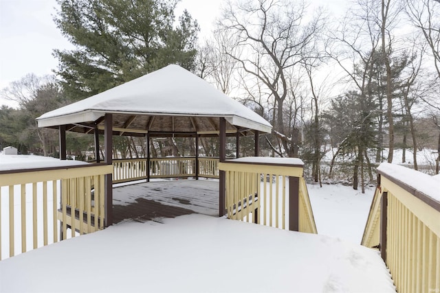 snow covered deck with a gazebo