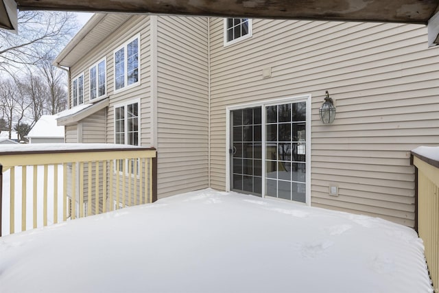 view of snow covered deck