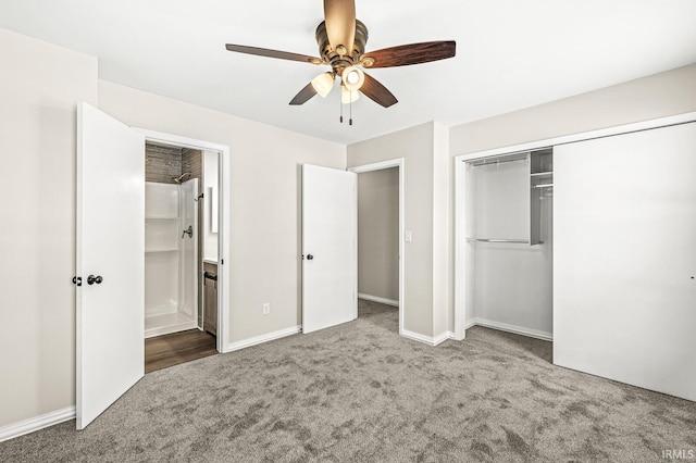 unfurnished bedroom featuring carpet, a closet, ceiling fan, and ensuite bath