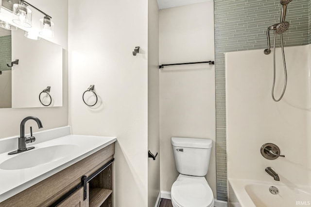 full bathroom with shower / bathing tub combination, vanity, and toilet