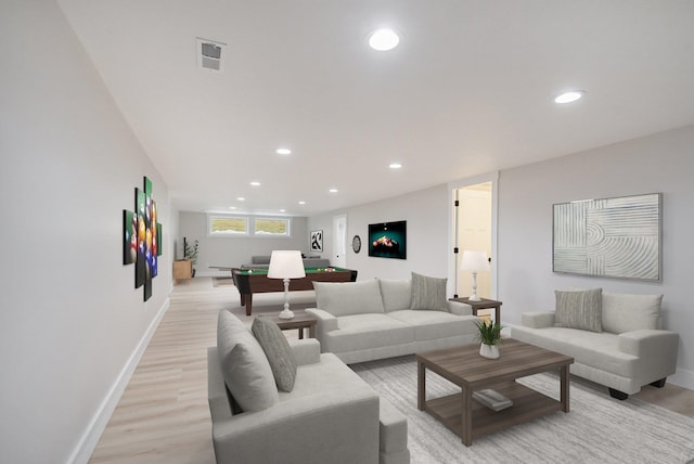 living room with light hardwood / wood-style flooring and pool table