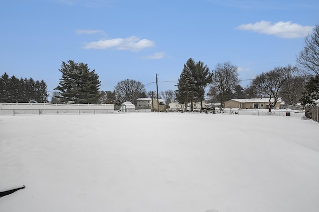 view of yard covered in snow