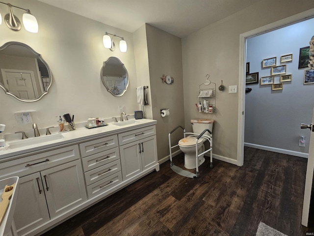 bathroom featuring vanity and wood-type flooring