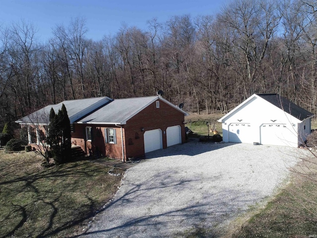 single story home with a garage