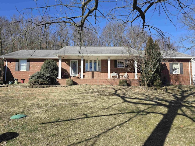 ranch-style house with a front yard