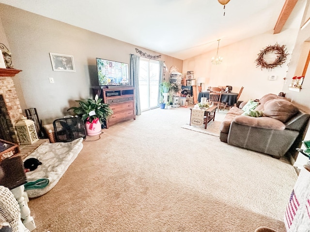 living room with a fireplace, an inviting chandelier, carpet floors, and lofted ceiling