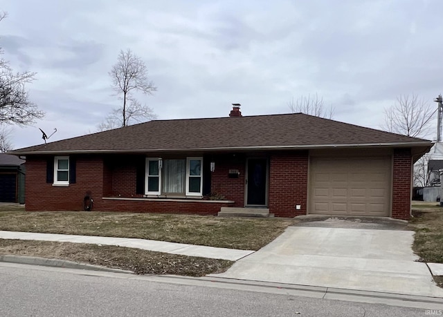 ranch-style home featuring a garage