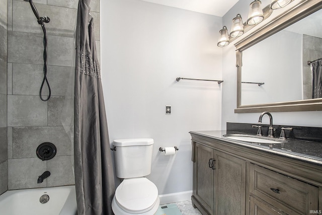 full bathroom with toilet, vanity, and shower / bath combo