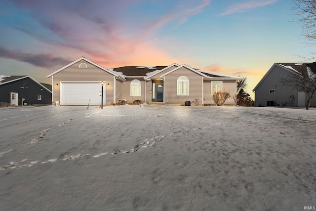 ranch-style home with a garage