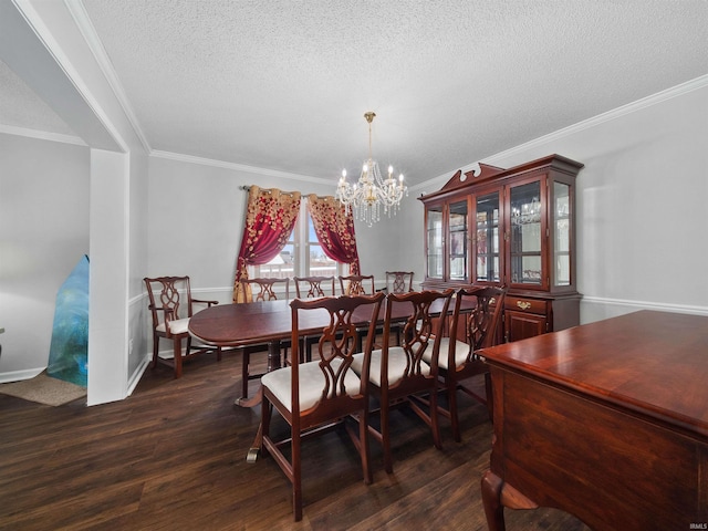 dining space with a chandelier, a textured ceiling, baseboards, dark wood finished floors, and crown molding