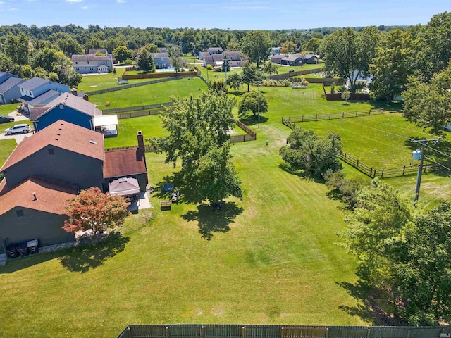 birds eye view of property with a residential view