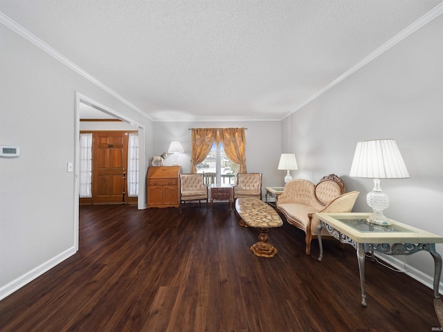 living area featuring dark wood-style flooring, crown molding, a textured ceiling, and baseboards