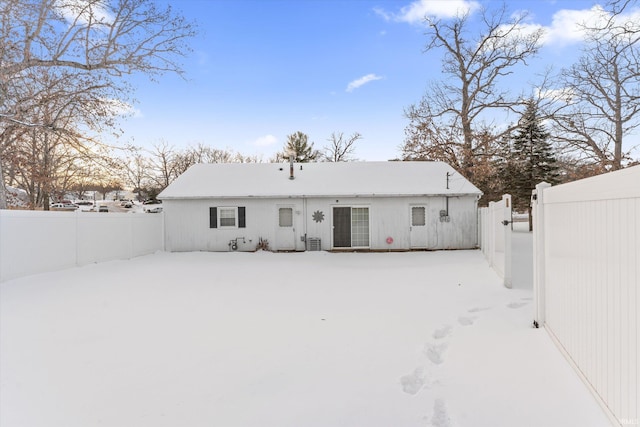 view of snow covered house